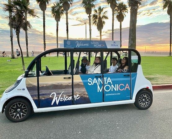 A group of people in a small car